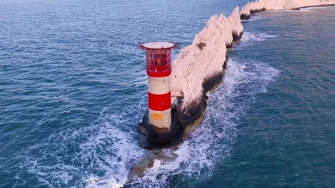 Top Down Aerial of The Needles Lighthouse and Alum Bay at Sunset Stock Footage 336780605