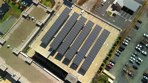Top Down Aerial Orbit Above A Parking Garage Roof With Solar Panels Stock Footage 341975493