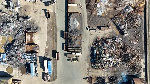 Top down aerial over sprawling metal scrapyard Stock Footage 331896381