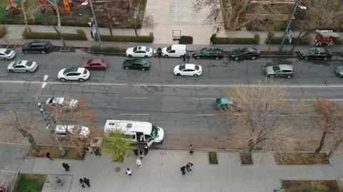 Top down aerial over streets and cars in suburbs in snow in Armenia, Erevan. Stock Footage 177941321