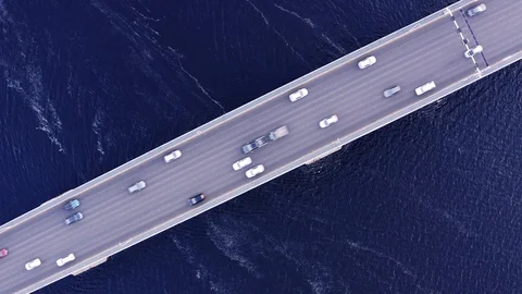 Top down aerial overhead of traffic over the Tasman bridge across the Derwent Stock Footage 127874491