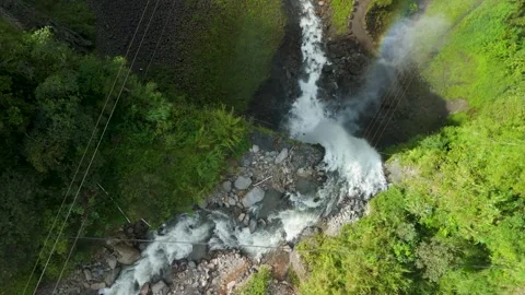 Top down aerial parallax view of Manto de la Novia waterfall in Banos Ecuador Stock-Footage 328646107