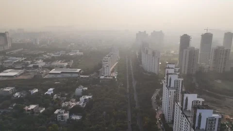 Top-down aerial perspective of Swarn Nagri Road featuring parallel apartment Vídeo Stock 328281601