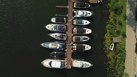 Top-Down Aerial Push-Forward over Luxury Yacht Marina at Sunrise Stock Footage 311643028