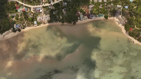 Top Down Aerial of Reef and Cloud Shadows in Shallow Bay, Koh Phangan Stock Footage 347979293