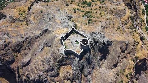 Top-Down Aerial Rotation Toward Ancient Stone Fortress Video stock 339632751