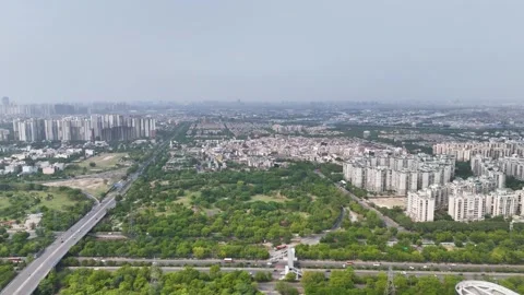 Top-down aerial shot capturing cars navigating through curved mountain roads. Stock Footage 312487326