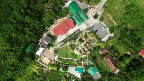 Top down aerial shot of Imeldas Garden Resort inside the mountain in Cuenca Видео 336722771