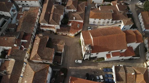 Top down aerial shot over old houses in Obidos Portugal Stock Footage