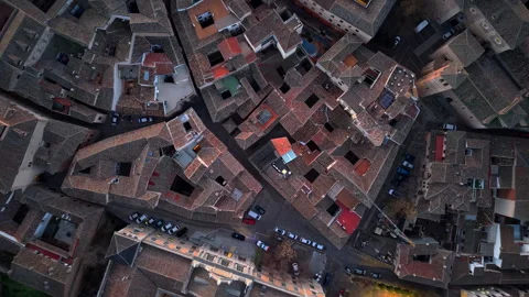 Top-Down Aerial Shot of Rooftops, Streets, and Cloisters of Toledo, at Sunrise Stock Footage 317159380