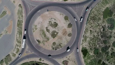 Top down, aerial shot: Traffic circle Stock Footage 246473552