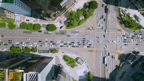 Top-Down Aerial Side Pass Along Gangnam Road Between Towers Stock Footage 345212516