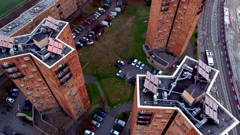 Top-down aerial of star-shaped buildings with solar panels, Paris suburb Stock Footage 327553824