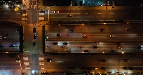 Top down aerial of traffic on major interstate highway at night in USA. Stock Footage 167578663