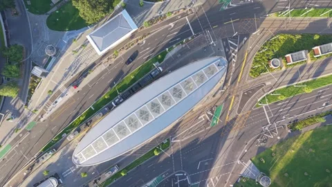 Top Down Aerial of Train departing Domain Interchange in Melbourne Stock Footage 325683845