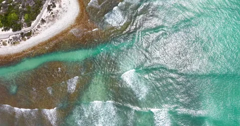 Top Down Aerial of Turquoise Ocean Waves and Coastal Reef Shoreline Stock Footage 330717208