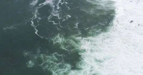 A top down aerial video of a large ocean wave breaking The Abstract Beauty .. Stock-Footage 316643392
