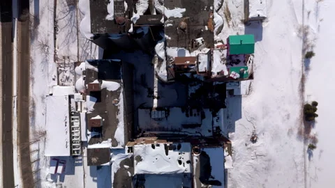 Top-Down Aerial View of Abandoned Industrial Site with Rooftop House in Montreal Stock Footage 303184096