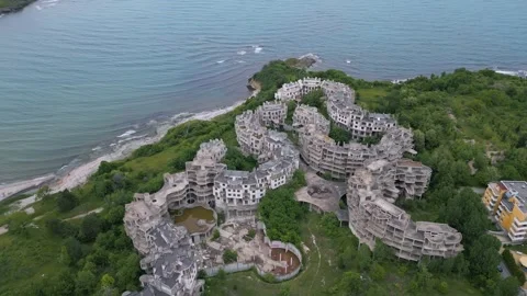 Top-down aerial view of abandoned hotel complex in Tsarevo, Bulgaria. Surreal Stock Footage 310386298