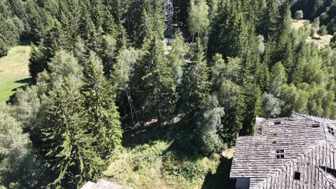 Top-down aerial view of an abandoned building construction site with a blue cran 動画素材 342714309