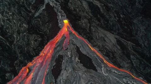 Top-Down Aerial View of Active Molten Lava Flowing Over Volcanic Rock Video stock 346855293