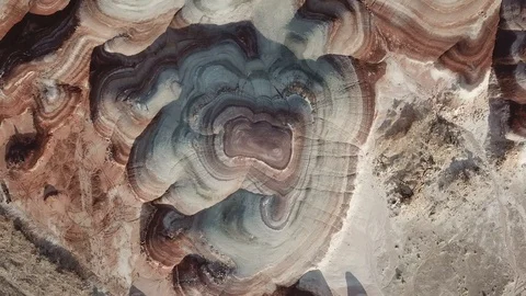 Top Down Aerial View of Amazing Striped Sandstone Hill Over Canyon in Utah Stock Footage 128955955