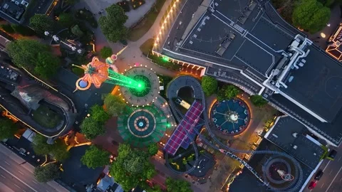 Top-down aerial view of amusement park after dark Stock Footage 336187151