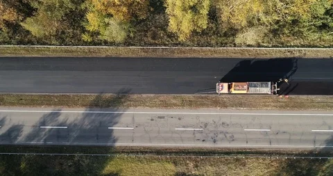 Top down aerial view: Asphalt laying. Top layer. 4k Stockbeeldmateriaal 103306719