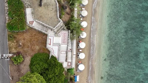 Top Down Aerial View of Beach Umbrellas and Coastal Promenade, Greece Stock Footage 327730537