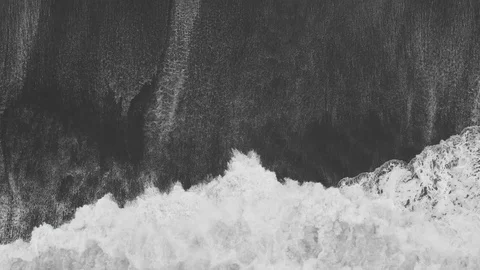 Top down aerial view on a black beach with white waves in Iceland Stock Footage 103381183