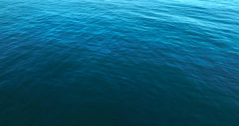 Top-Down Aerial View of Blue Ocean Waves and Water Texture. ProRes HQ Nature and Stock Footage 281448772