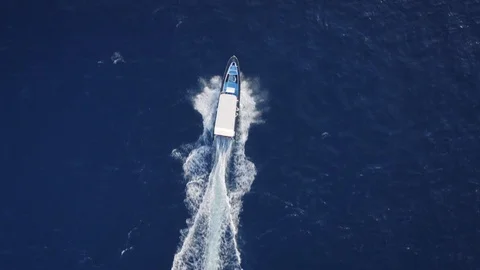 Top Down Aerial View of Boat Sailing on High Speed. Nusa Penida, Bali - Indon Stock Footage 113950147