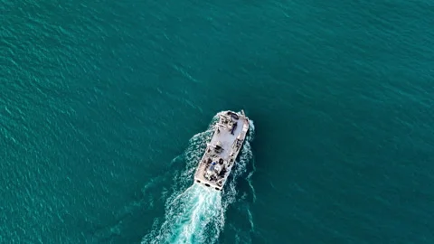Top down aerial view of boat on water Stock Footage 331945249