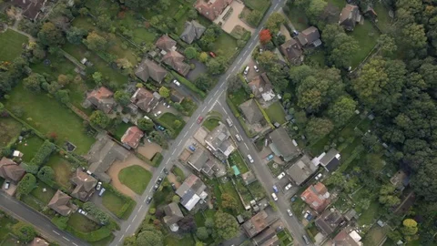 Top down aerial view of British houses surrounded by countryside Stock Footage 118263688