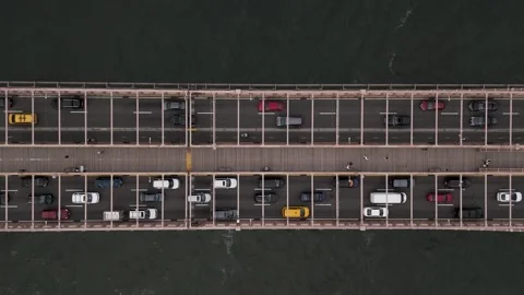 Top down aerial view of Brooklyn bridge , pedestrians and car traffic Stock Footage 280925701