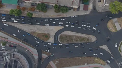 Top Down Aerial View of Busy Traffic and Road Patterns in Chisinau Видео 345114632