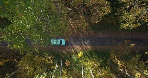 Top down aerial view of car stopping in park people getting ready for picnic  Stock Footage 101264291