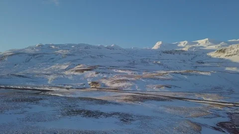 Top down aerial view of car driving on road in volcanic landscape in Iceland. Stock Footage 128671418