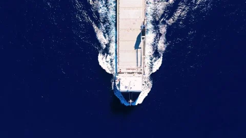 Top-down aerial view of cargo ship water wake Stock Footage 335646962
