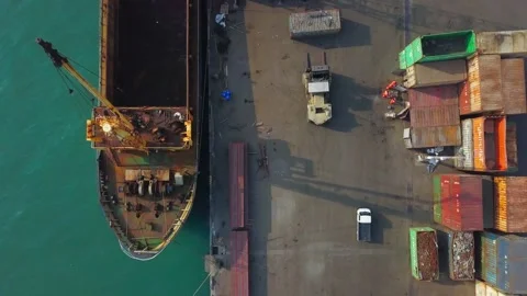 Top Down Aerial View of Cargo Ship and Port Containers Taiwan 4K Video stock 346288670