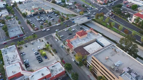 Top down aerial view of city neighborhood depicting urban lifestyle Stock Footage 143463359