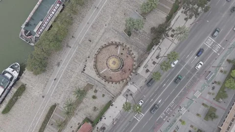 Top down aerial view of city traffic around a roundabout Stock-Footage 342261539