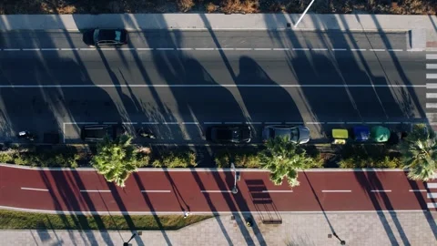 Top Down Aerial View of City Street and Bike Path Stock Footage 344529586