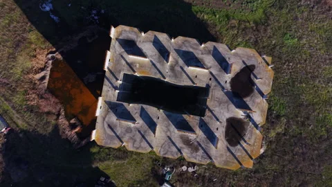 Top down aerial view of concrete building structure 스톡 동영상 334312640
