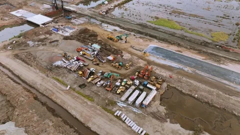 Top Down Aerial View of Construction Machinery Fleet Parked on Site Stock Footage 327124432