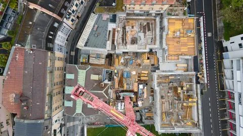 Top down aerial view of construction site with crane in Montreux Switzerland Stock Photos