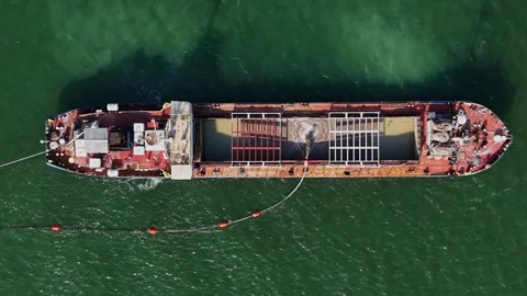 Top down aerial view of a dredging vessel cargo hold Stock Footage 338187365
