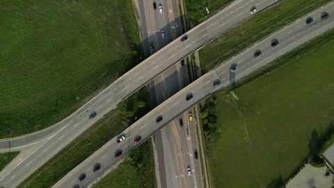 Top down aerial view from drone on modern traffic junction of multiple lane Stock Footage 244677714