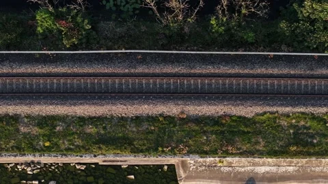 Top Down Aerial View Of Empty Train Tracks In Rural Landscape Stock Footage 346418289