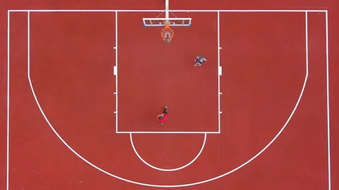 Top Down Aerial View of Father and Son Play Basketball Together 库存影片 259577774